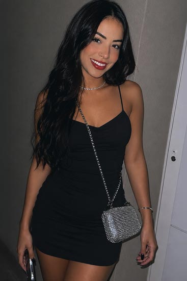 Short, tattooed escort in Copacabana.